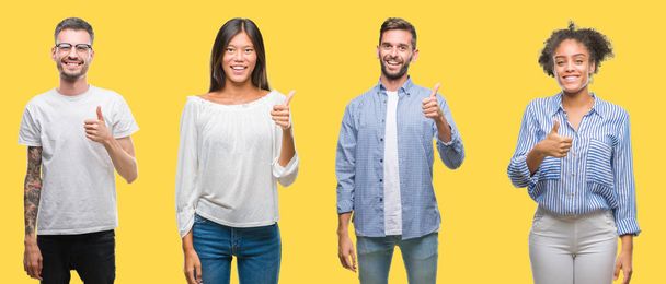 Collage of group people, women and men over colorful yellow isolated background doing happy thumbs up gesture with hand. Approving expression looking at the camera showing success. - Photo, Image
