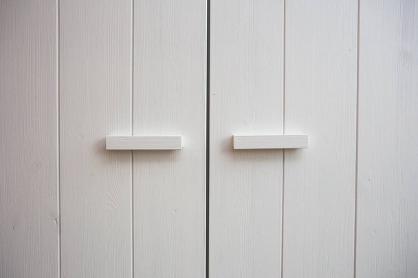 White wooden Closet doors close up background texture modern design - Foto, Bild