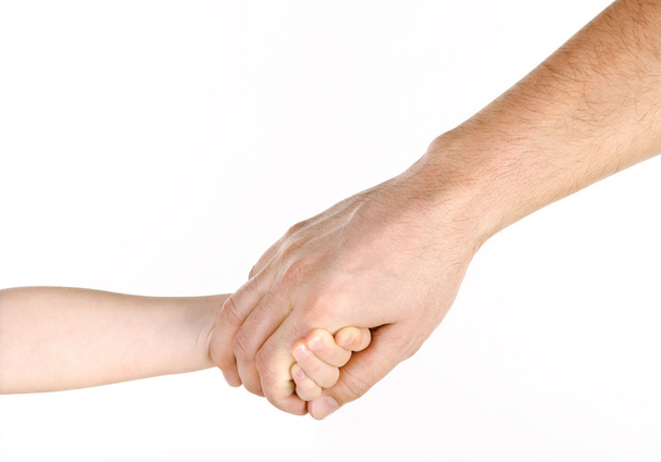 Father giving hand to a child - Foto, imagen