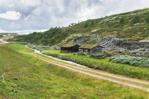 View of Snodoldalssaetra farm from the national tourist route Rondane, Norway - Fotó, kép