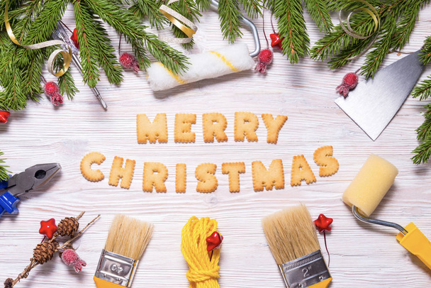 Building tools on wooden background, Marry Christmas Concept - Foto, afbeelding