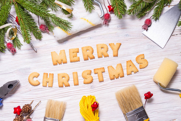 Building tools on wooden background, Marry Christmas Concept - Foto, afbeelding
