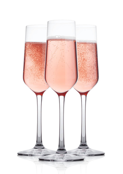 Elegant Rose pink champagne glasses with bubbles  on white background with reflection - Φωτογραφία, εικόνα