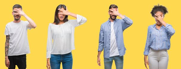 Collage of group people, women and men over colorful yellow isolated background peeking in shock covering face and eyes with hand, looking through fingers with embarrassed expression. - Foto, imagen