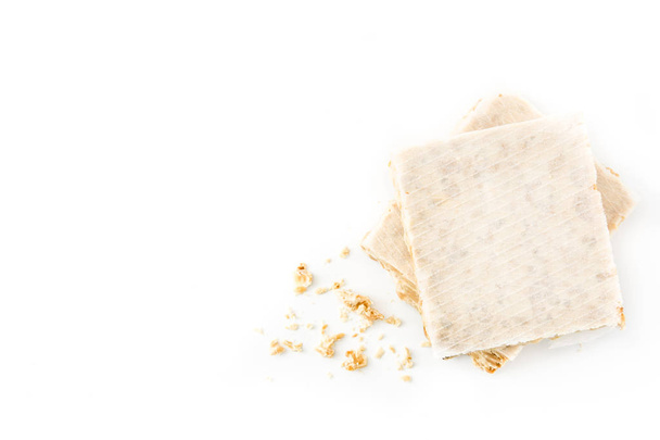 Typical christmas almond nougat isolated on white background. Top view. Copyspace - Foto, Bild