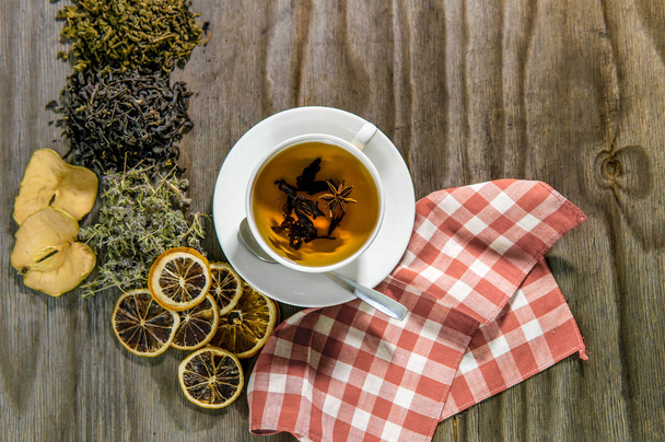Traditional tea drinknig concept, variety of different tea on wooden background - Φωτογραφία, εικόνα