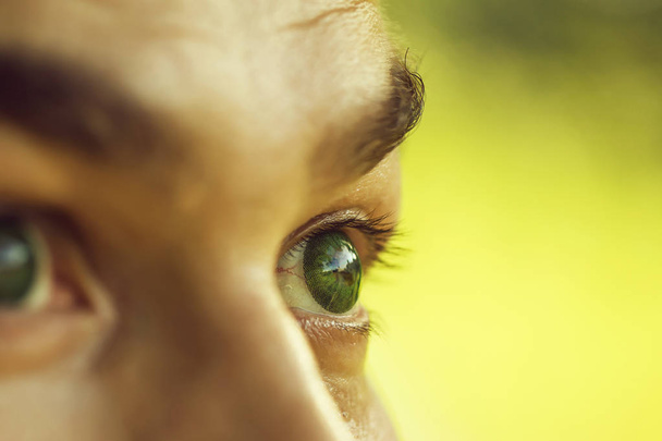 male eye with dotty lens - Zdjęcie, obraz