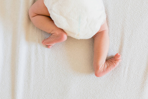 Small bare and soft baby feet. - Photo, Image