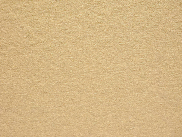 Brown paper cardboard useful as a background, soft pastel colour - Photo, Image