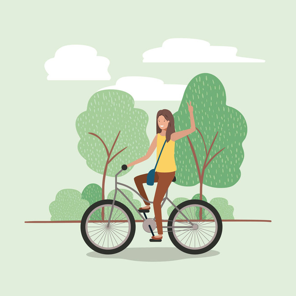 Junge Frau mit Fahrrad im Park - Vektor, Bild