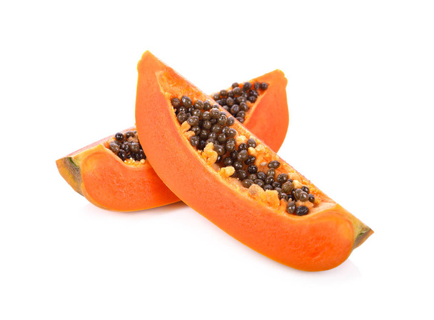 papaya matura di taglio con semi su sfondo bianco
 - Foto, immagini