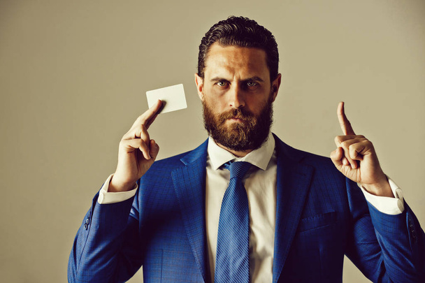 blank business card in hand of man or executive - Foto, imagen