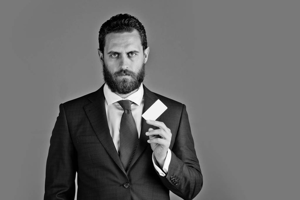 office man with paper credit card, business ethics and fashion - Фото, изображение