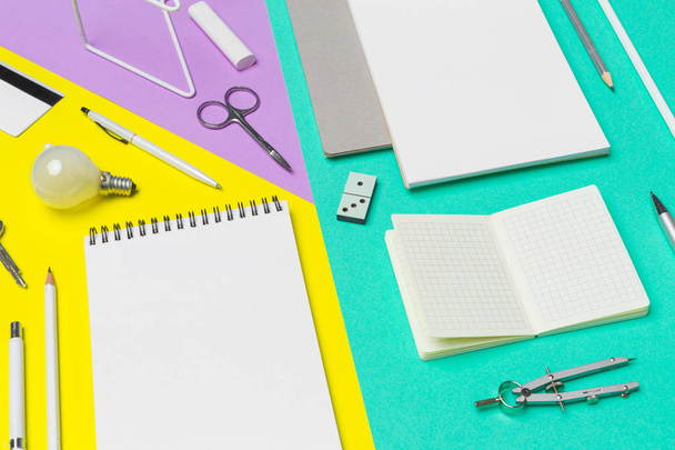 school supplies at colorful paper background - Foto, Imagen