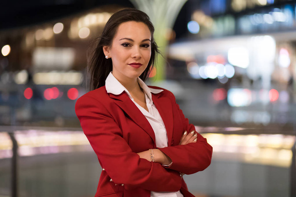 Smiling businesswoman with crossed arms outdoor - Φωτογραφία, εικόνα