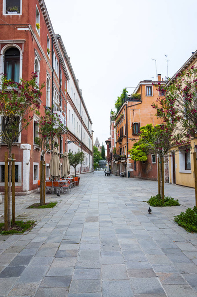 Cozy Old Town pedestrian street in Venice Italy - Photo, Image