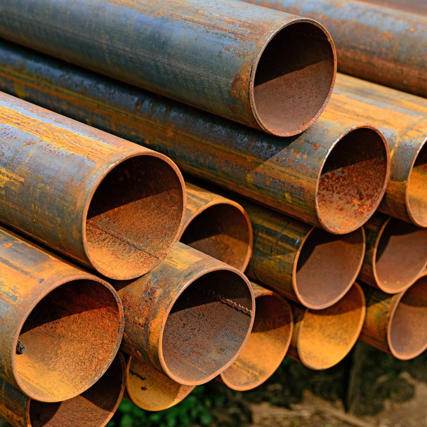 Pipes are steel in an industrial landscape - Photo, Image