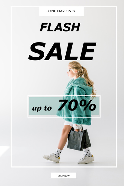 blonde female child in turquoise fur coat posing with black shopping bags on white, sale banner concept - Foto, Bild