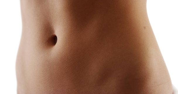 Primer plano de la mujer sana en forma de estómago plano
 - Foto, imagen