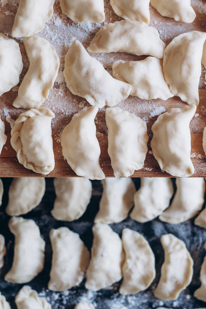 Dumplings raw on a dark board. Traditional homemade food.  Process of cooking dumplings.  - Foto, Imagem