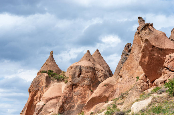 Rock formations and cave town in Zelve Valley, Cappadocia, Turkey - 写真・画像