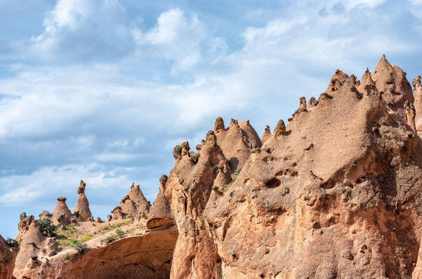 Rock formations and cave town in Zelve Valley, Cappadocia, Turkey - Zdjęcie, obraz