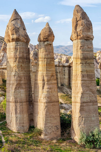 Rock formations in Love Valley in Cappadocia , Turkey - Fotó, kép