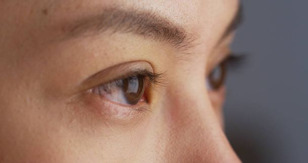 Close up of Mixed race woman's eyes - Фото, изображение