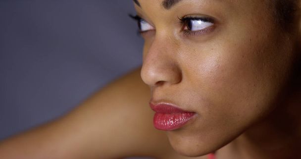 Closeup of african woman looking at camera - Fotó, kép