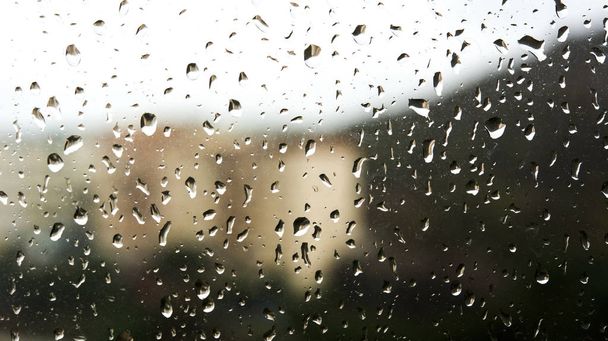 Krople deszczu wody na tle okna - Zdjęcie, obraz