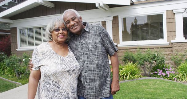Retired African couple embracing each other on yard - Photo, Image