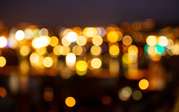 Міські вогні вночі. Розфокусований розмитий фон міських будівель боке
 - Фото, зображення
