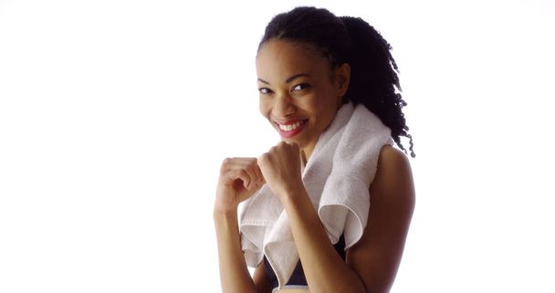 Fit Black woman throwing punches at camera - Photo, Image