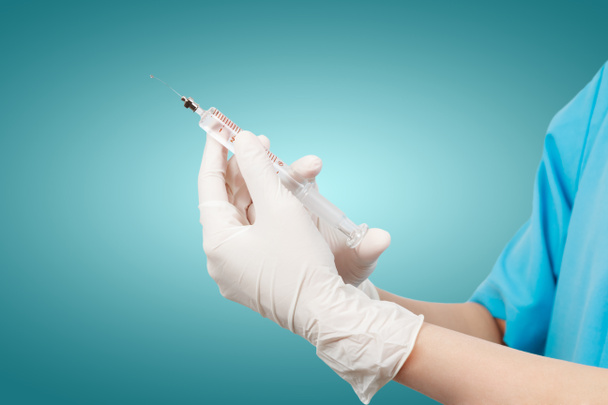 Doctor's hands holding syringe - Photo, Image