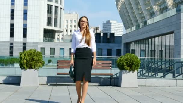 4K. Office rest time. Long-hair  business woman  in office area suddenly dance  - Footage, Video