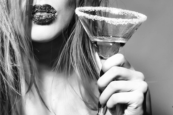 Glass of martini in female hands - Fotoğraf, Görsel