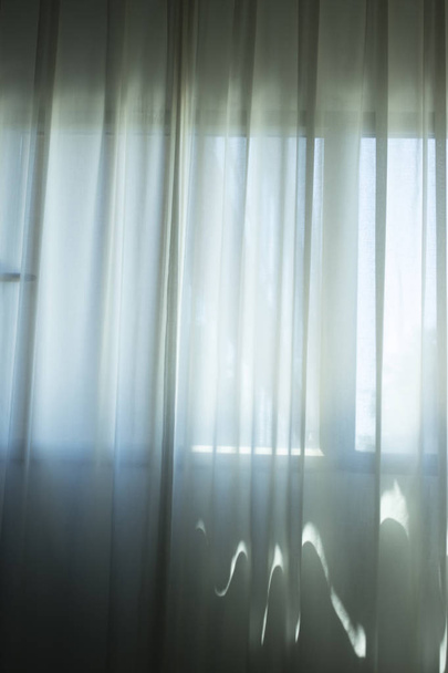 Hotel bedroom net curtains window with soft dalylight light. - Zdjęcie, obraz