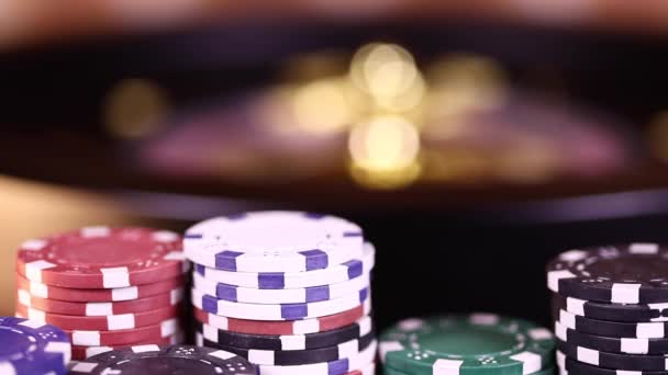 Colorful poker chips and cards on table - Footage, Video