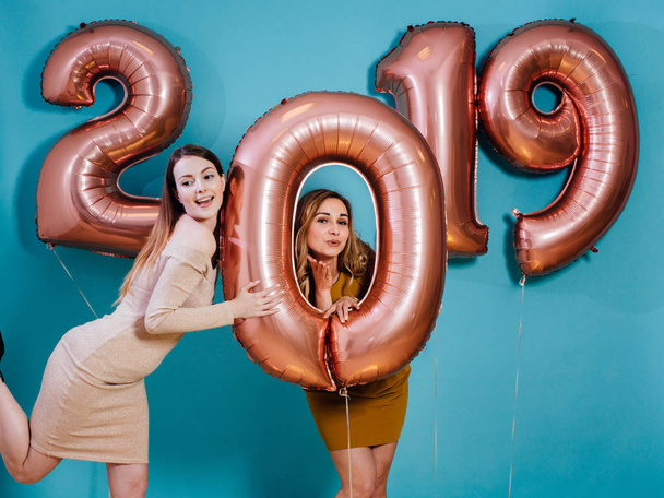 Happy new year and Merry Christmas Beautiful young women with balloons. - Foto, Bild
