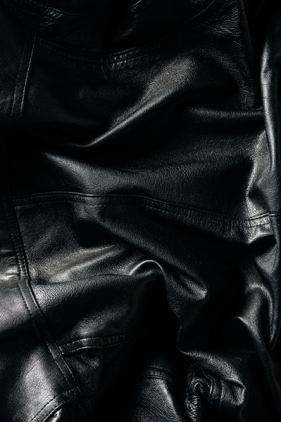 plein cadre de veste en cuir noir comme fond
  - Photo, image