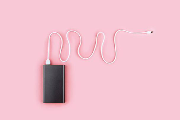 power bank gadget on a pastel background. - Photo, Image
