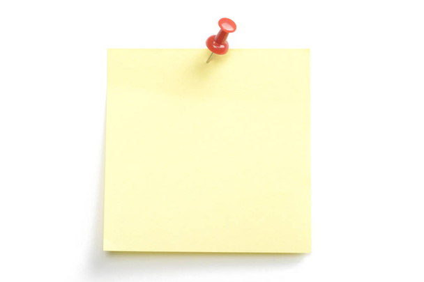 Note or posit with red pin on white background - Photo, Image