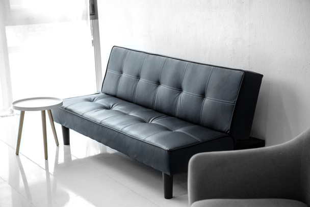 selective focus of modern living room with leather sofa and armchair  - 写真・画像