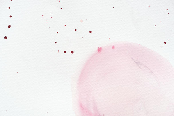 abstract light pink watercolor painting with splatters on white paper - Photo, Image