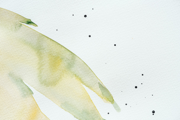 abstract green and yellow watercolor painting on white paper - Fotó, kép