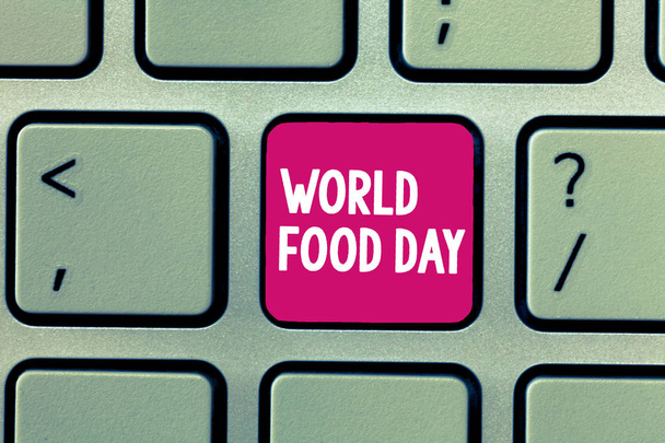 Концептуальні рукописний показ Всесвітній день продовольства. Бізнесі фото демонстрації Всесвітній день дій, присвячений вирішення глобальних голод - Фото, зображення
