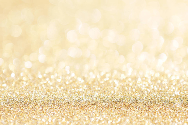 abstracte achtergrond gouden licht bokeh kerstvakantie - Foto, afbeelding