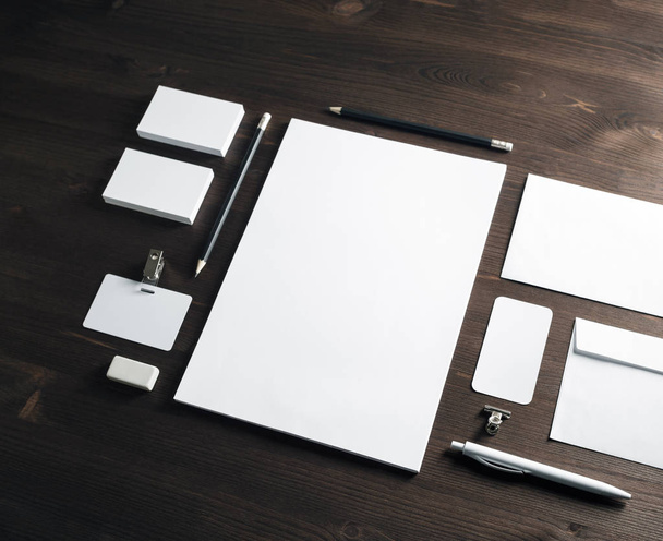 Corporate identity mockup. Blank stationery set on wood table background. Responsive design template. - Фото, зображення