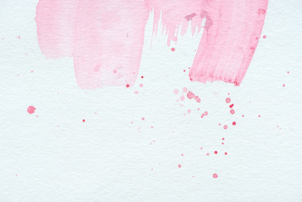 abstract texture with pink watercolor strokes and splatters - Foto, imagen