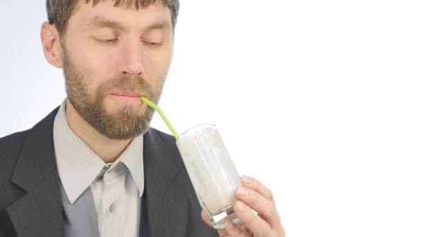 bearded businessman drinks detox smoothie, healthy lifestyle concept. cocktail from vegetable and fruit. 4K - Felvétel, videó